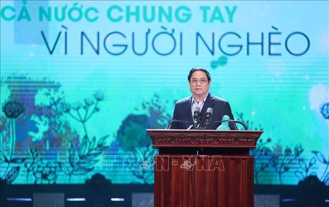 Thủ tướng Phạm Minh Chính phát biểu, vận động ủng hộ giúp đỡ người nghèo nhân Tháng cao điểm "Vì người nghèo" năm 2022. Ảnh: TTXVN.