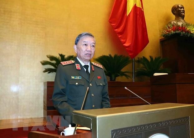 Đại tướng Tô Lâm, Bộ trưởng Bộ Công an trình bày Báo cáo công tác phòng, chống tội phạm và vi phạm pháp luật năm 2022. (Ảnh: TTXVN)