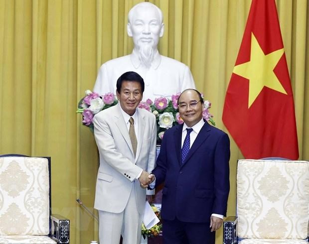 Chủ tịch nước Nguyễn Xuân Phúc tiếp cựu Đại sứ đặc biệt Việt Nam-Nhật Bản Sugi Ryotaro. (Ảnh: TTXVN)