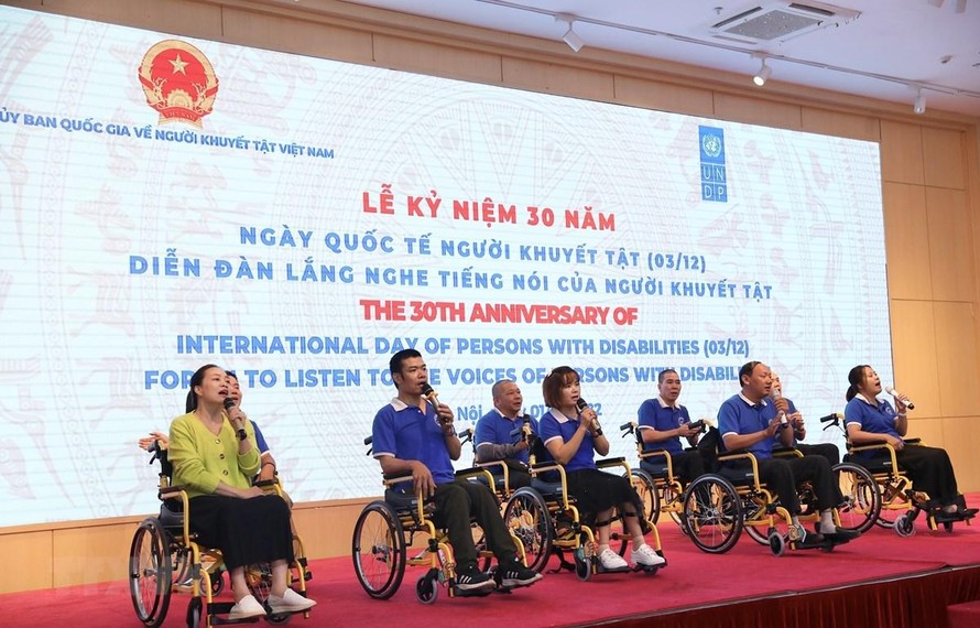 Lễ kỷ niệm 30 năm Ngày Quốc tế về người khuyết tật (3/12). (Ảnh: Hoàng Hiếu/TTXVN) 