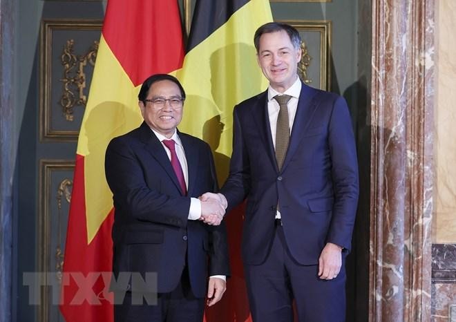 Thủ tướng Chính phủ Phạm Minh Chính và Thủ tướng Vương quốc Bỉ Alexander De Croo. (Ảnh: Dương Giang/TTXVN)