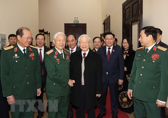 Tổng Bí thư Nguyễn Phú Trọng cùng các đồng chí lãnh đạo Đảng, Nhà nước với đại biểu dự đại hội. (Ảnh: Trí Dũng/TTXVN)