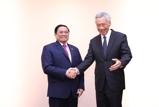 Thủ tướng Phạm Minh Chính gặp Thủ tướng Singapore Lý Hiển Long hồi tháng 5/2022 tại Mỹ. (Ảnh: Dương Giang/TTXVN)