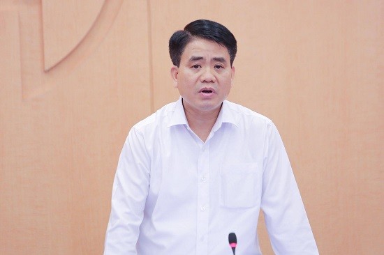 Ông Nguyễn Đức Chung trong một cuộc họp. Ảnh: NLĐ