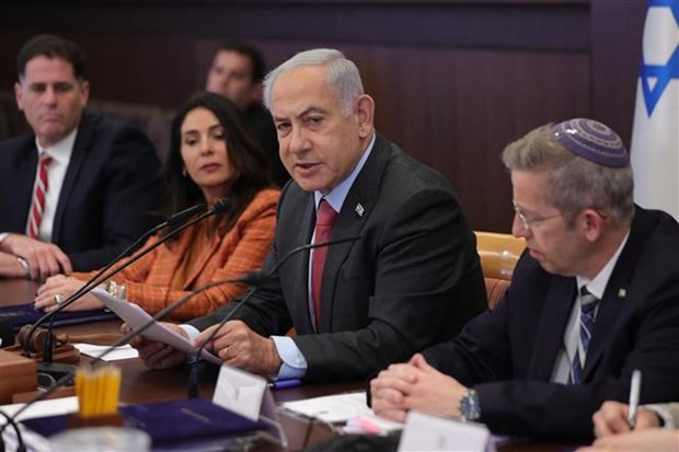Thủ tướng Israel Benjamin Netanyahu (giữa) phát biểu tại cuộc họp nội các ở Jerusalem ngày 19/3/2023. 