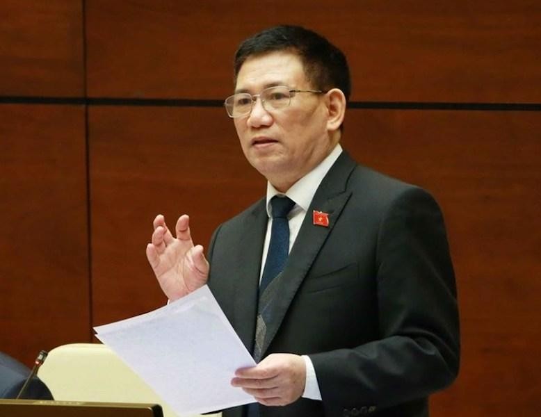 Bộ trưởng Bộ Tài chính trình bày báo cáo trước Quốc hội