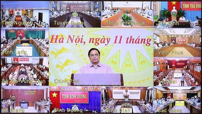 Thủ tướng Phạm Minh Chính chủ trì hội nghị tại điểm cầu Chính phủ. Ảnh: TTXVN