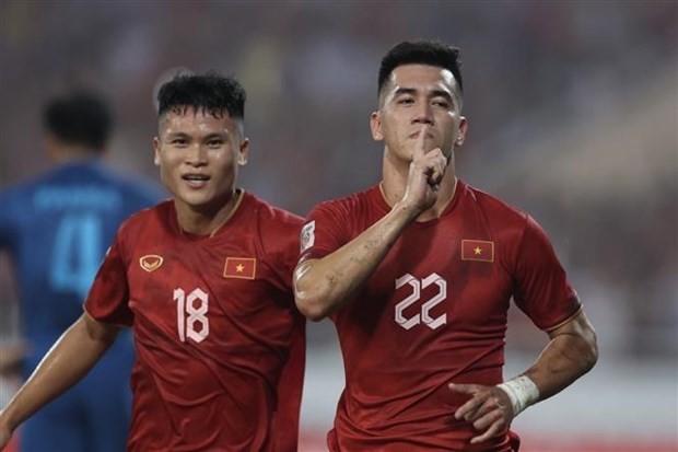 Tiền đạo Tiến Linh (số 22) là một trong bốn cái tên của đội tuyển Việt Nam xuất hiện trong đội hình tiêu biểu của AFF Cup 2022. (Ảnh: Hoàng Linh/TTXVN)