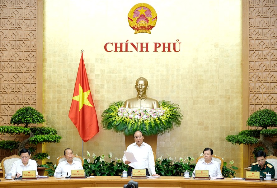 Thủ tướng Nguyễn Xuân Phúc yêu cầu phải thực hiện cho được mục tiêu kiểm soát lạm phát năm 2018 ở mức dưới 4%. Ảnh: VGP/Quang Hiếu
