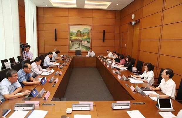 Đại biểu Quốc hội thành phố Đà Nẵng và các tỉnh Sơn La, Ninh Bình, Tây Ninh thảo luận. (Ảnh: Dương Giang/TTXVN)