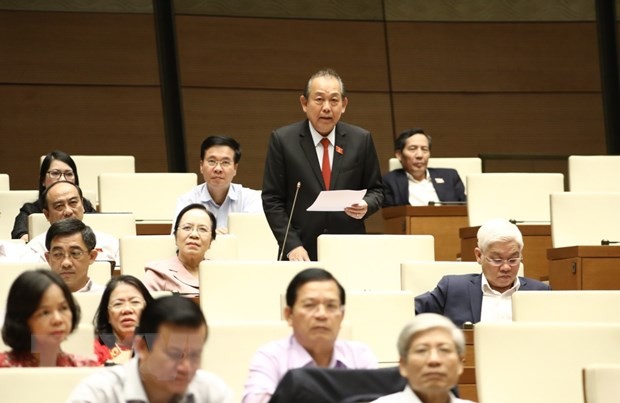 Phó Thủ tướng Thường trực Chính phủ Trương Hòa Bình trả lời những chất vấn thuộc trách nhiệm của Chính phủ. (Ảnh: Văn Điệp/TTXVN)