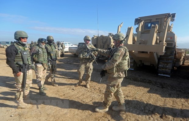 Binh sỹ Mỹ làm nhiệm vụ tại căn cứ quân sự Basmaya của Iraq. (Ảnh: AFP/TTXVN)