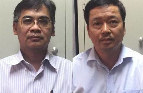 Hai bị can Từ Thành Nghĩa (trái) và Võ Quang Huy lúc mới bị bắt