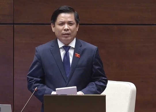 Bộ trưởng Bộ Giao thông vận tải Nguyễn Văn thể trả lời chất vấn (Ảnh: KT)