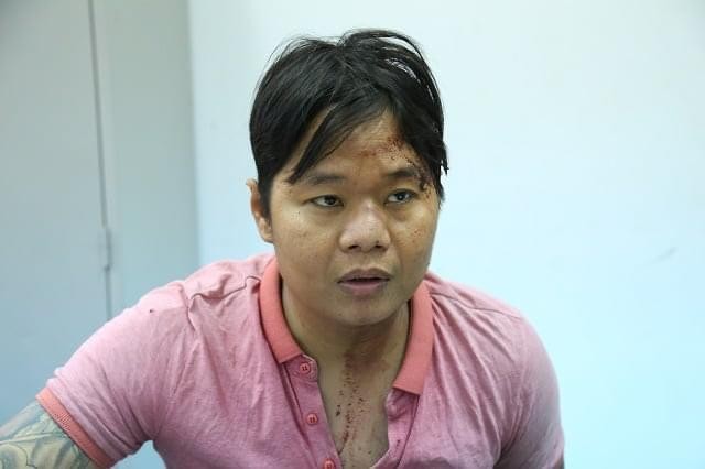 Nguyễn Thanh Hùng tại cơ quan công an sau khi bị bắt - Ảnh: C.T.V./Tuổi trẻ