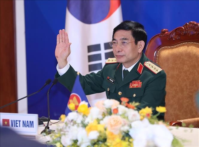 Đại tướng Phan Văn Giang, Bộ trưởng Bộ Quốc phòng dự tại điểm cầu Hà Nội. Ảnh: Trọng Đức/TTXVN