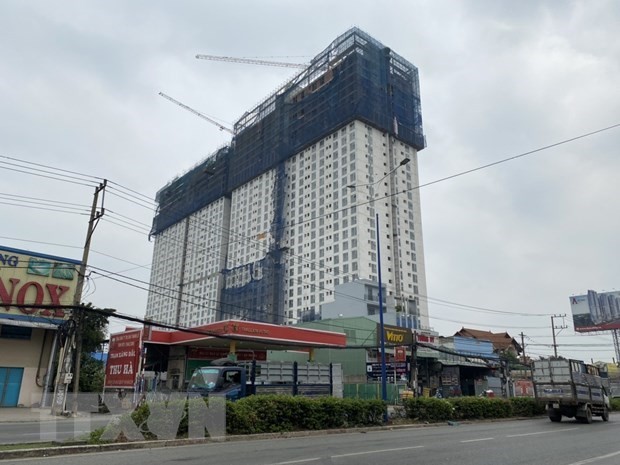 Dự án Roxana Plaza được xây dựng tại vị trí sát cổng chào Bình Dương, phường Vĩnh Phú, thành phố Thuận An. (Ảnh: TTXVN phát)