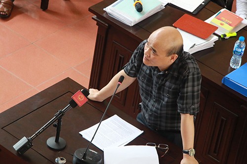 Ông Nguyễn Huy Quang tại phiên toà ngày 29/5. Ảnh: Phạm Dự.