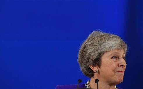 Thủ tướng Anh Theresa May phát biểu tại một cuộc họp báo bên lề hội nghị thượng đỉnh EU tại Brussels ngày 18/10. (Ảnh: AFP)