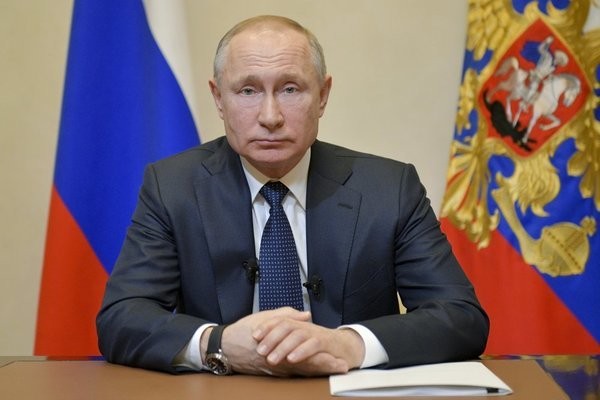 Tổng thống Nga Vladimir Putin thông báo hoãn trưng cầu dân ý vào ngày 25/3. (Ảnh: AFP)
