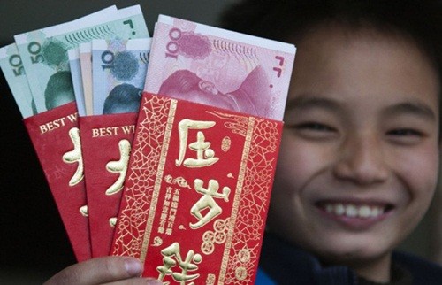  Nhu cầu tiền mặt cận Tết của người Trung Quốc đang lên rất cao. Ảnh: China Daily