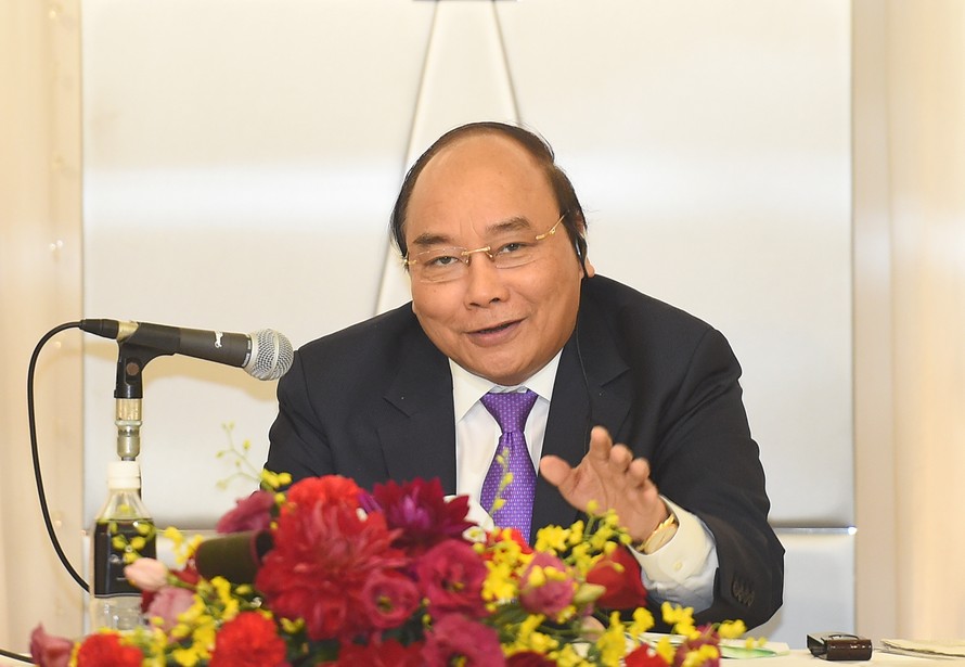 Thủ tướng Chính phủ Nguyễn Xuân Phúc phát biểu tại tọa đàm. Ảnh: VGP/Quang Hiếu
