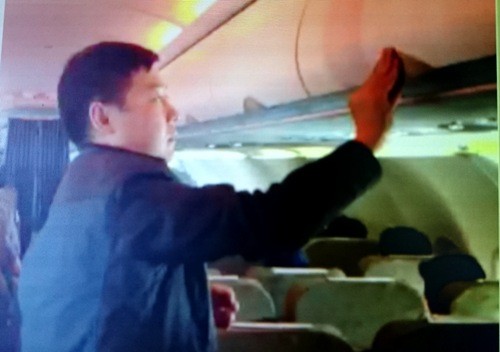 Bắt thêm một người Trung Quốc trộm tiền trên máy bay