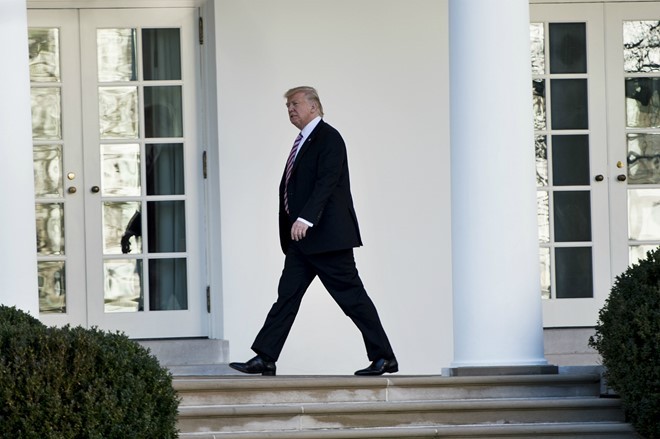 Tổng thống Trump vẫn chưa quen hoàn toàn với cuộc sống ở Washington D.C. trong khi 2 tuần đầu nhiệm kỳ của ông đã trôi qua đầy sóng gió. Ảnh: AFP.