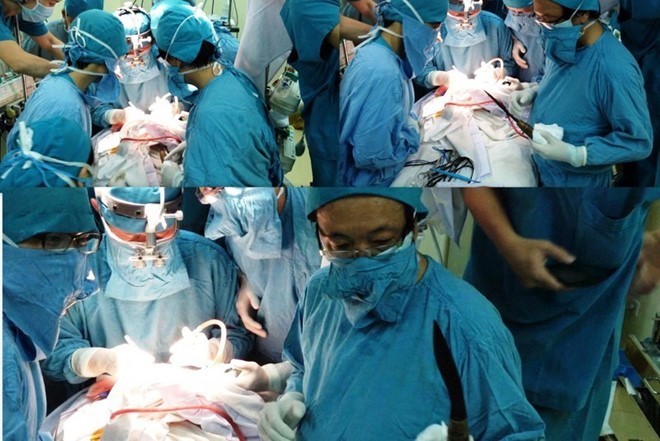 Bác sĩ Đào Trung Hiếu và ê kíp mổ lấy dao ra khỏi đầu, cứu sống bé trai 11 ngày tuổi theo quy trình báo động đỏ. 