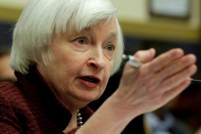 Fed tiếp tục tăng lãi suất lần thứ hai trong vòng 3 tháng, đưa mức lãi suất cơ bản lên 0,75-1%. Ảnh: Reuters.