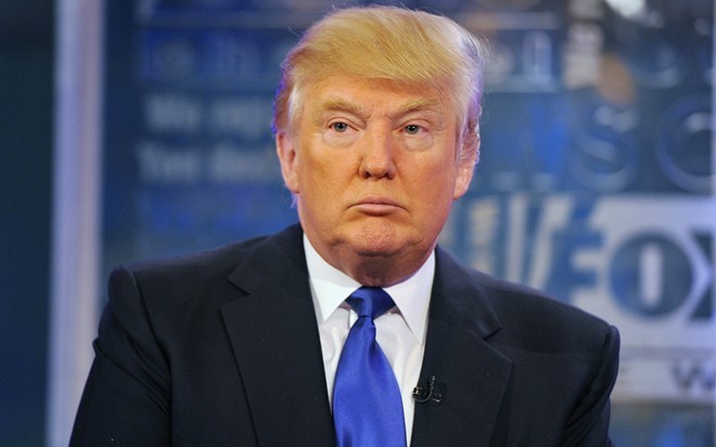 Tổng thống Mỹ Donald Trump mất 1 tỷ USD và tụt 220 bậc trên bảng xếp hạng người giàu nhất thế giới của Forbes. Ảnh: The Huffington Post.