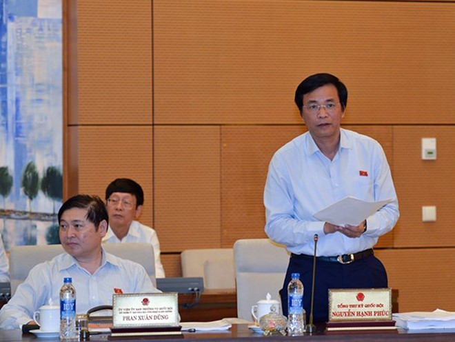 Tổng thư ký Quốc hội Nguyễn Hạnh Phúc trình bày báo cáo chường trình kỳ họp thứ 3. Ảnh: Quochoi.vn