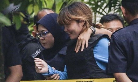 Nghi phạm Đoàn Thị Hương trong phiên xét xử ngày 14/4. Ảnh: AFP