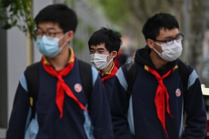 Quan chức Trung Quốc kêu gọi học sinh không đeo khẩu trang khi tập thể dục