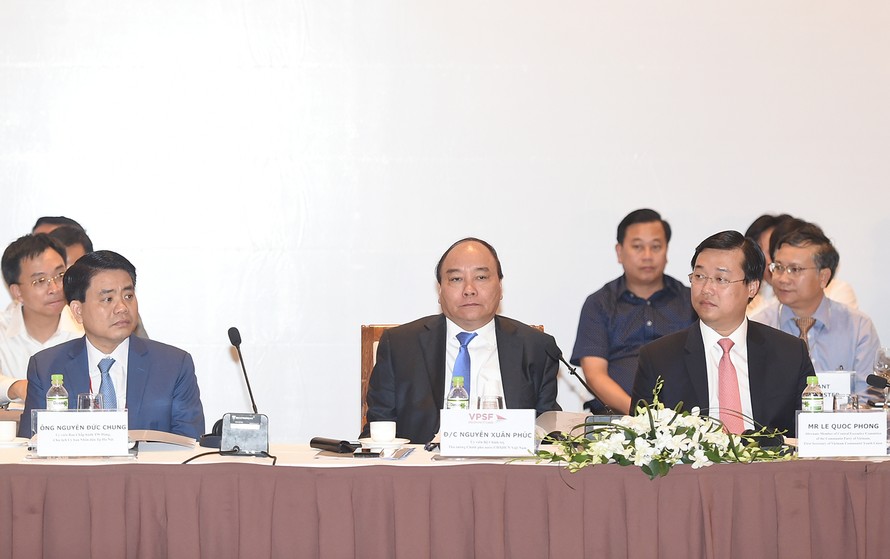 Thủ tướng Nguyễn Xuân Phúc tại diễn đàn Kinh tế Tư nhân Việt Nam. Ảnh: VGP/Quang Hiếu