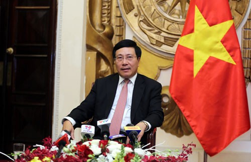 Phó Thủ tướng, Bộ trưởng Bộ Ngoại giao Phạm Bình Minh chia sẻ về thành công của Tuần lễ Cấp cao APEC. Ảnh: VGP/Hải Minh