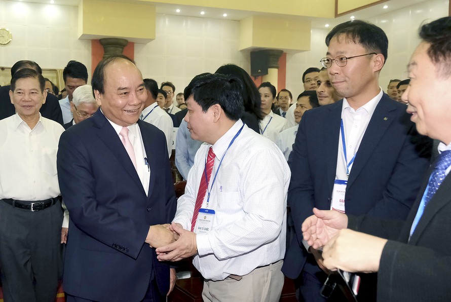 Thủ tướng Nguyễn Xuân Phúc dự Hội nghị xúc tiến đầu tư tại Bình Phước. Ảnh VGP/Quang Hiếu