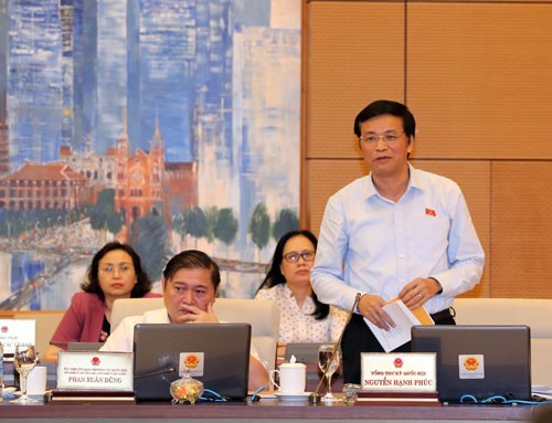 Tổng Thư ký Quốc hội Nguyễn Hạnh Phúc trình bày nhiều nội dung về kỳ họp thứ 6 sắp tới của Quốc hội. Ảnh: TTXVN