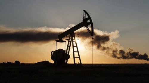 Căng thẳng thương mại phủ bóng thị trường dầu khí Mỹ. Ảnh minh hoạ: AFP
