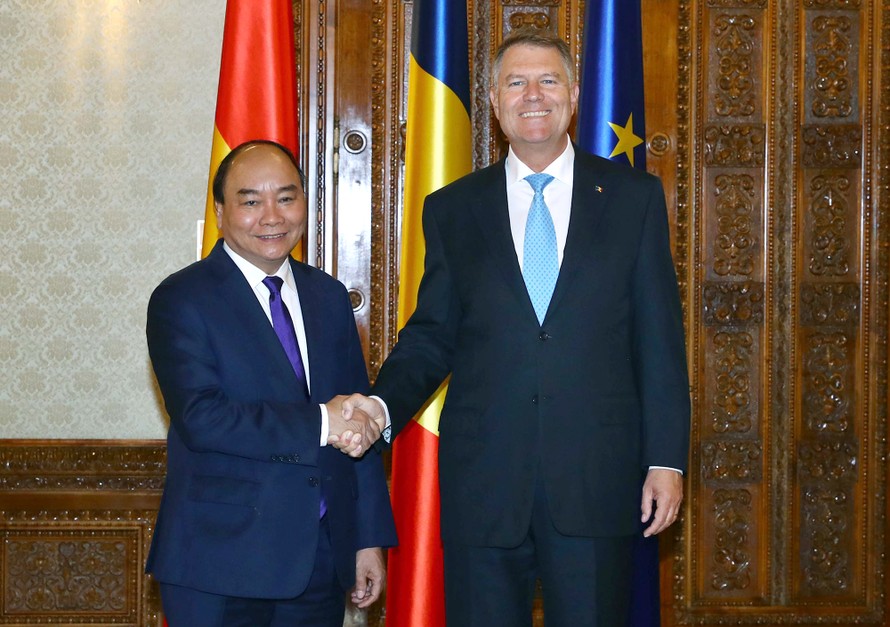 Thủ tướng Nguyễn Xuân Phúc và Tổng thống Romania Klaus Iohannis. Ảnh: VGP