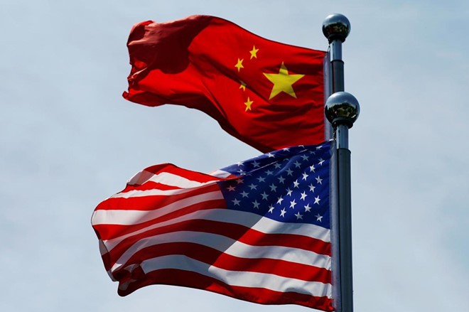 Mỹ và Trung Quốc đang mắc kẹt trong một cuộc chiến tranh thương mại. Ảnh: Reuters.