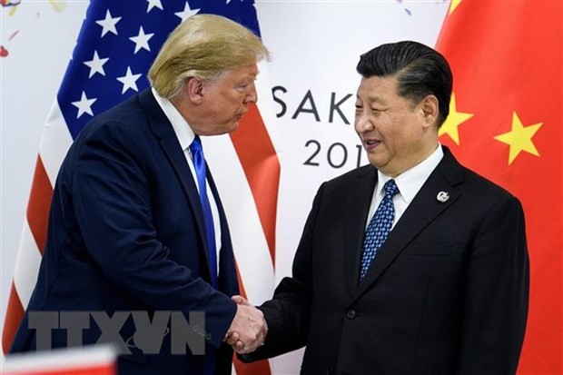 Tổng thống Mỹ Donald Trump (trái) và Chủ tịch Trung Quốc Tập Cận Bình tại cuộc gặp ở thành phố Osaka, Nhật Bản ngày 28/6/2019. (Nguồn: AFP/TTXVN)