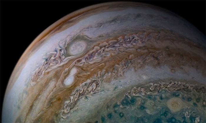 Vụ sáp nhập bão trên sao Mộc do tàu vũ trụ Juno ghi lại. (Ảnh: NASA).