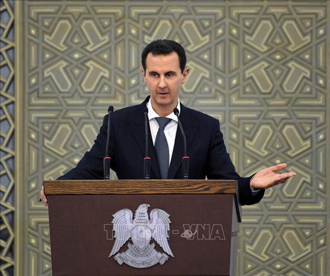 Tổng thống Syria Bashar al-Assad phát biểu tại Damascus. Ảnh: AFP/ TTXVN