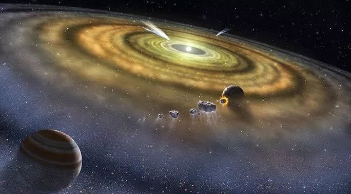Ảnh đồ họa mô tả Hệ Mặt trời sơ khai, khi mới có hành tinh đầu tiên là sao Mộc được ra đời hoàn chỉnh và các thiên thạch chondrites vẫn còn lang thang khắp nơi - (ảnh: ASTRONOMY).