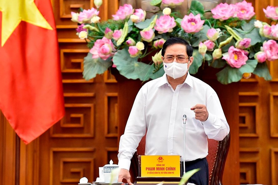 Thủ tướng Phạm Minh Chính phát biểu kết luận cuộc làm việc với Bộ Xây dựng - Ảnh: VGP/Nhật Bắc