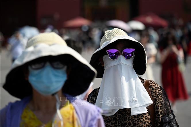 Trung Quốc ban bố cảnh báo màu vàng về nhiệt độ cao và thảm họa địa chất