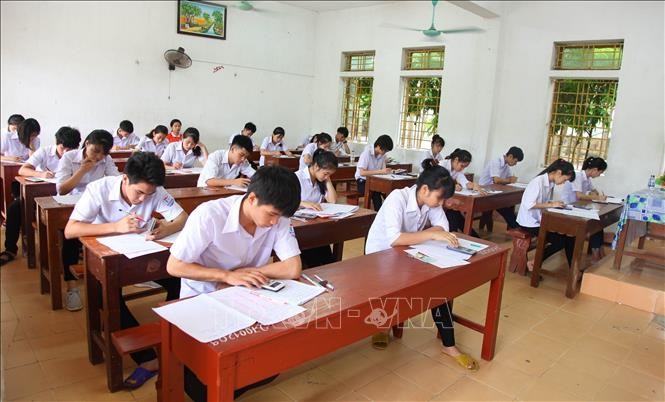 Các thí sinh dự thi kỳ thi THPT quốc gia 2018 tại điểm thi THPT Nho Quan C, huyện Nho Quan, tỉnh Ninh Bình, ngày 27/6/2018. Ảnh: Hải Yến/TTXVN