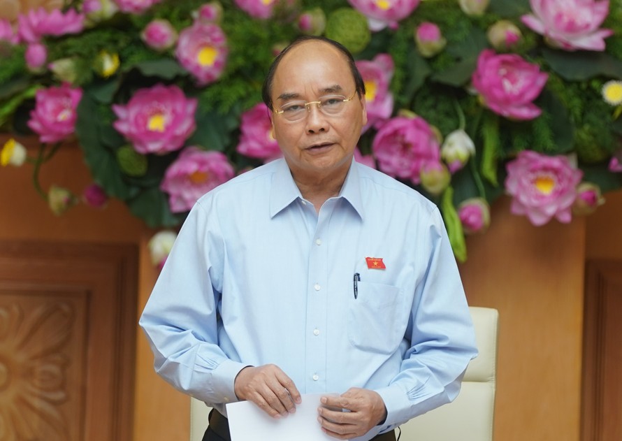 Thủ tướng Nguyễn Xuân Phúc phát biểu tại cuộc họp. - Ảnh: VGP/Quang Hiếu 