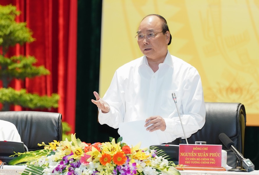 Thủ tướng Nguyễn Xuân Phúc phát biểu kết luận Hội nghị. - Ảnh: VGP/Quang Hiếu
